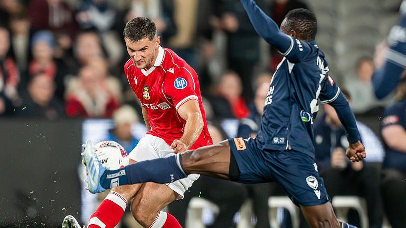 Wrexham's Ryan Longman in action against Melbourne Victory