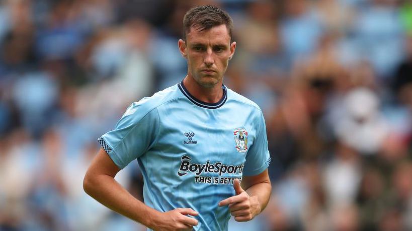 Dom Hyam in action for Coventry City in 2021