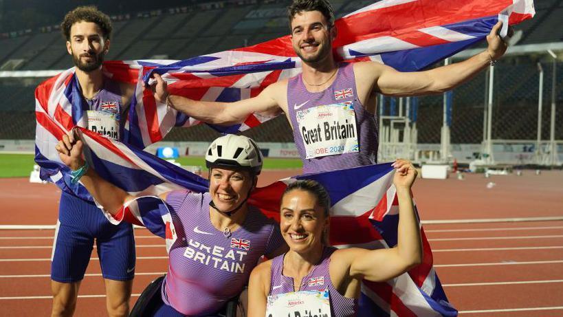 Kevin Santos, Hannah Cockroft, Zac Shaw and Ali Smith pose after winning medals for Great Britain in Kobe