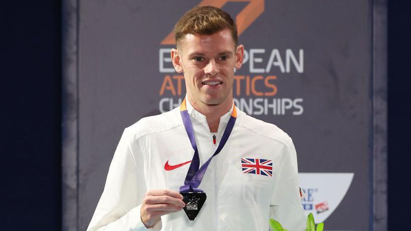 Jake Heyward with his 1,500m silver at the 2022 European Athletics Championships