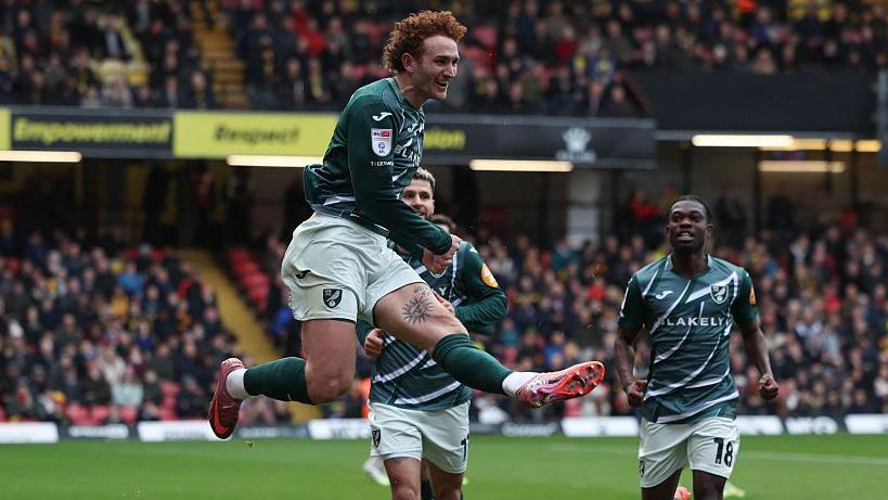 Josh Sargent leaps into the air to celebrate scoring against Watford