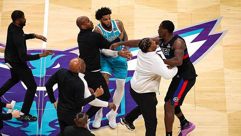 Charlotte Hornets forward Miles Bridges has an altercation with the Detroit Pistons' Jalen Duren
