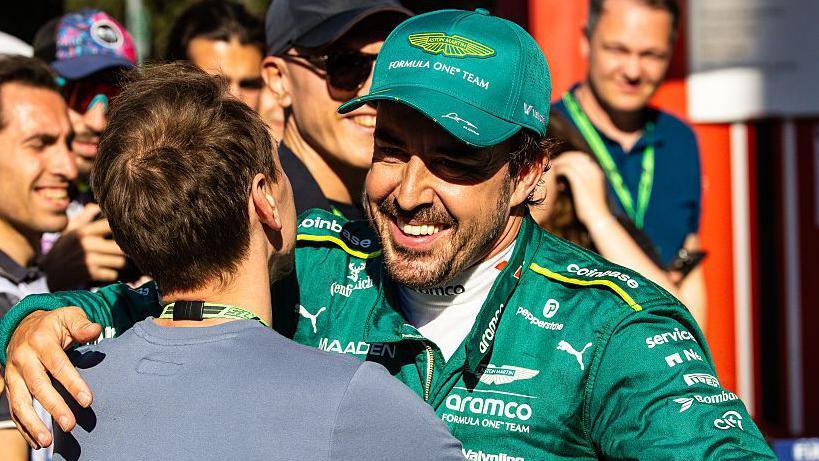 Aston Martin's Fernando Alonso smiling after qualifying fifth in Imola