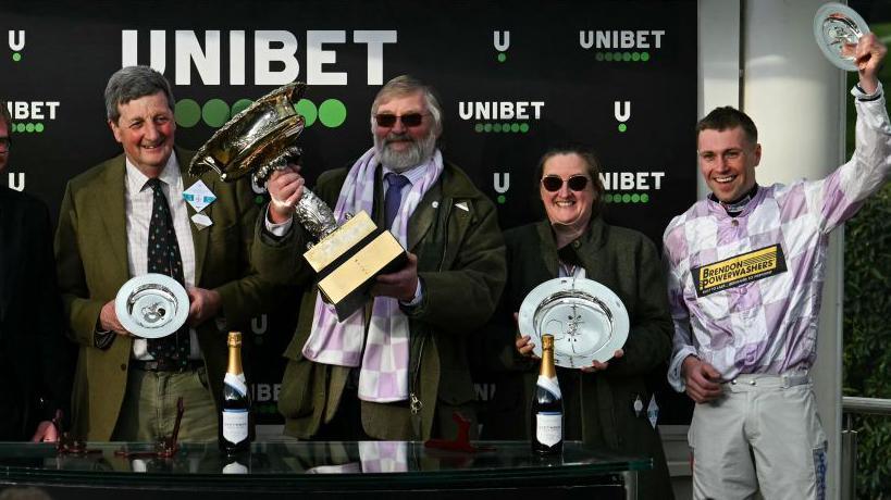 Jeremy Scott, Ian Gosden and Lorcan Williams celebrating their Champion Hurdle win. 