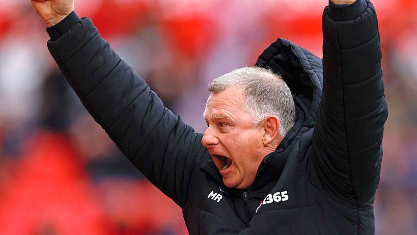 Mark Robins celebrates a Stoke goal