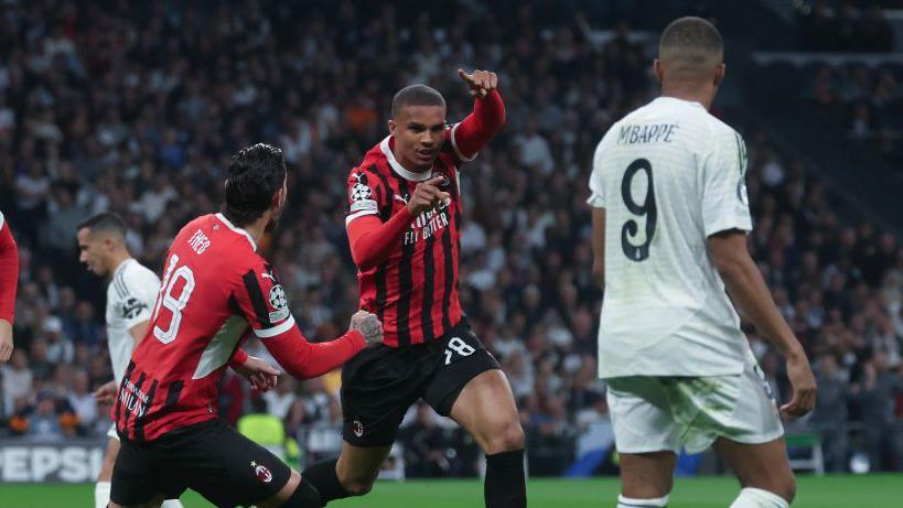 Malick Thiaw celebrates scoring the first AC Milan goal