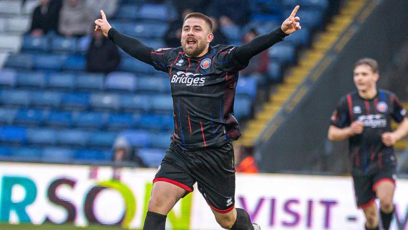 Aldershot Town celebrates one of his three goals against Oldham in January