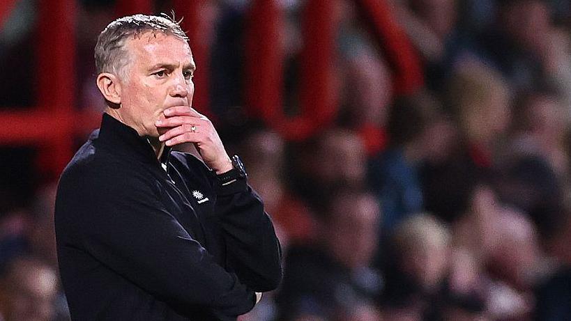 Phil Parkinson watches on deep in thought