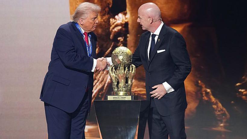 U.S. President Donald Trump receives the Fifa Peace Prize from Fifa President Gianni Infantino at the Fifa World Cup 2026 draw
