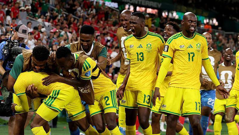 South Africa celebrate scoring against South Korea