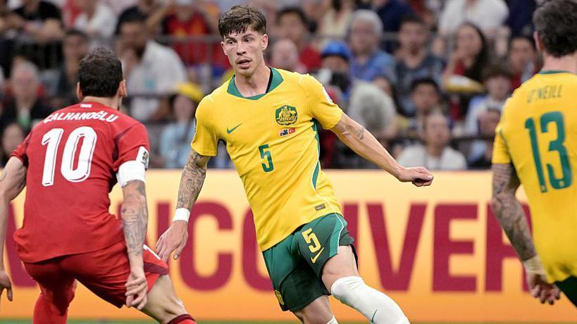 Jordan Bos in action for Australia against Turkey during a World Cup group-stage match.