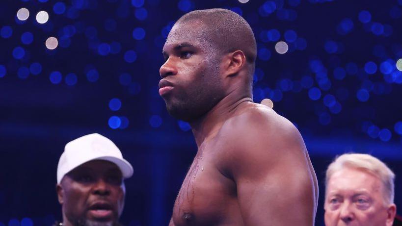 Daniel Dubois looks on in the ring waiting for a fight to start