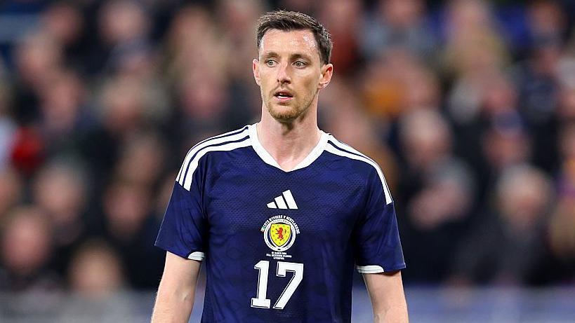 Dom Hyam in action for Scotland in the spring 