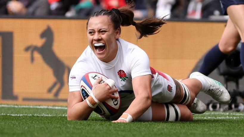 Maddie Feaunati celebrates a try