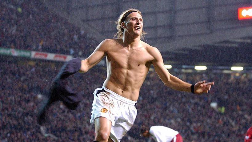 Diego Forlan celebrating scoring with his shirt off at Old Trafford