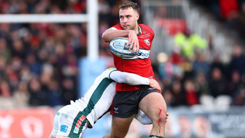 Max Llewellyn carries the ball for Gloucester at Kingsholm