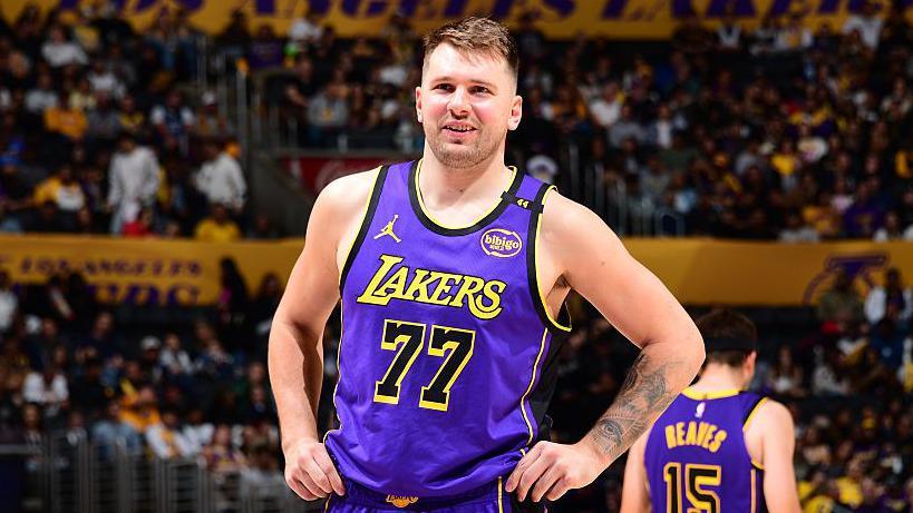 Luka Doncic puts his hands on his hips