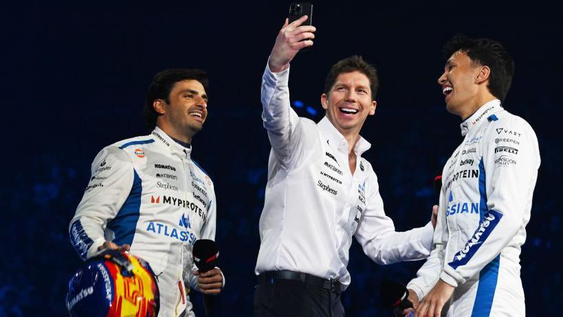 Williams driver Carlos Sainz (left), alongside team boss James Vowles and Alex Albon