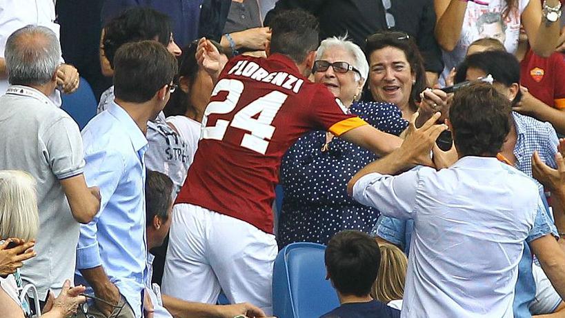 Alessandro Florenzi hugs his grandmother