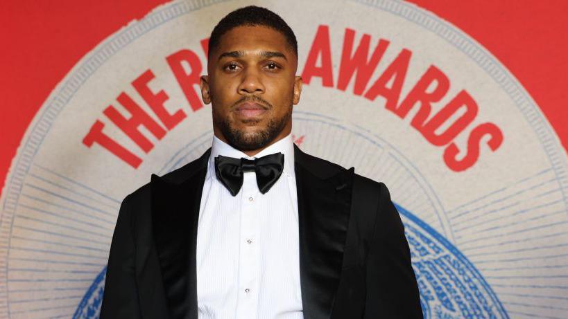 Anthony Joshua in a tuxedo 