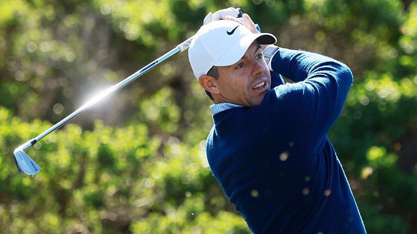 Rory McIlroy tees off
