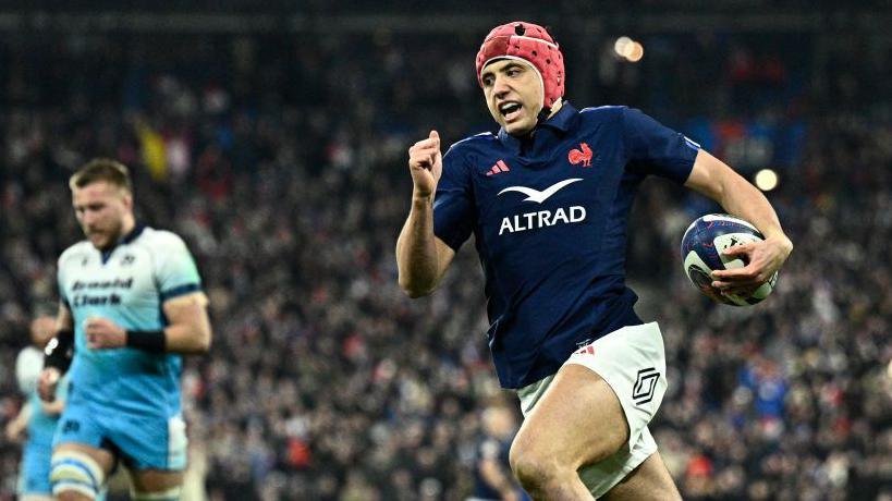 Louis Bielle-Biarrey running away from Scotland's defence to score in France's title-clinching win on the final day of the 2025 tournament