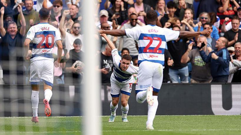 Paul Smyth celebrates acrobatically after scoring for QPR against Charlton Athletic 