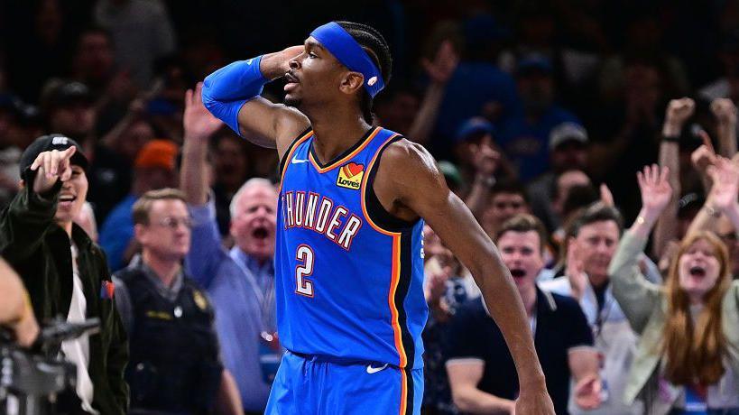 Shai Gilgeous-Alexander celebrates after scoring against the New Orleans Pelicans.