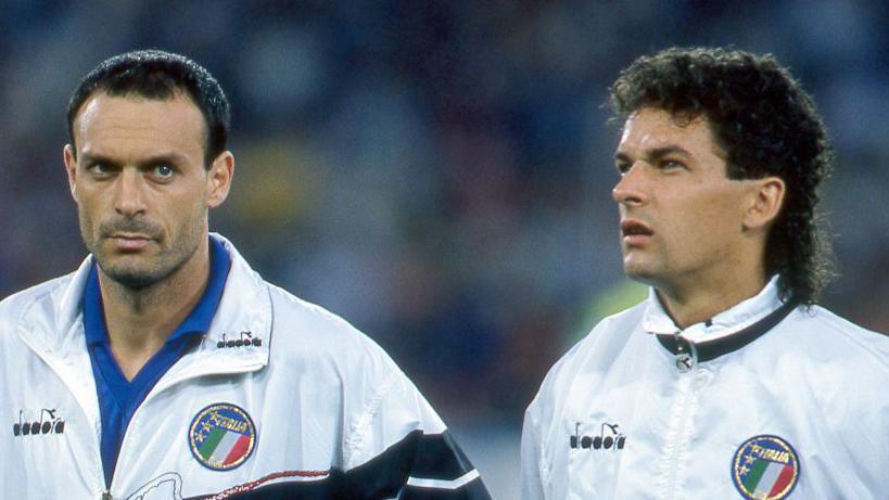 Schilllaci (left) pictured with Roberto Baggio