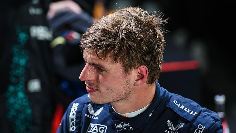 Max Verstappen with perspiration on his head and face after qualifying in Singapore 
