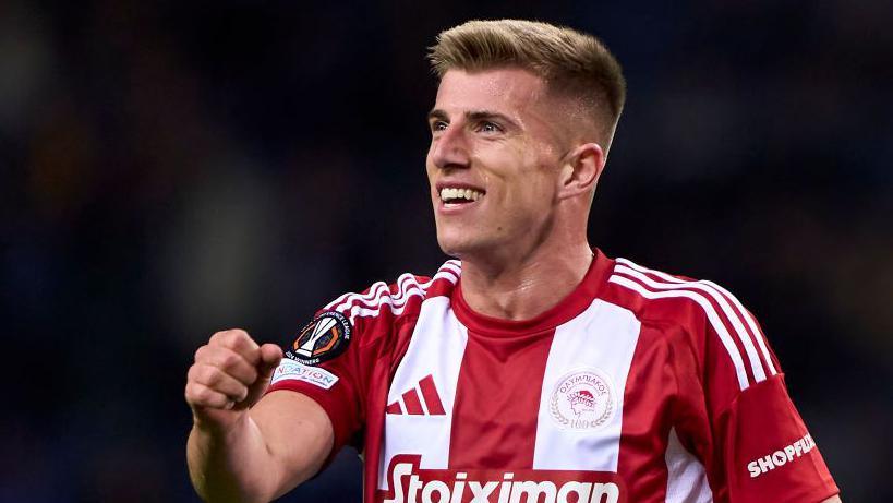 Costinha of Olympiacos smiles during his team's Europa League match at Porto in January 2025
