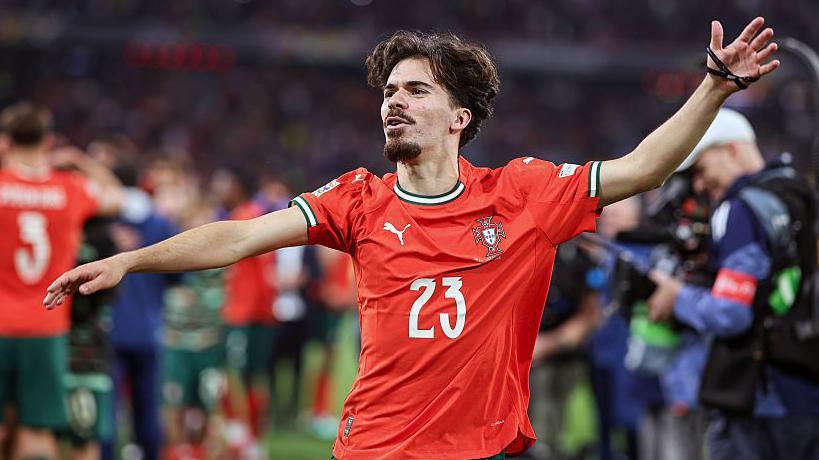 Vitinha of Portugal celebrates