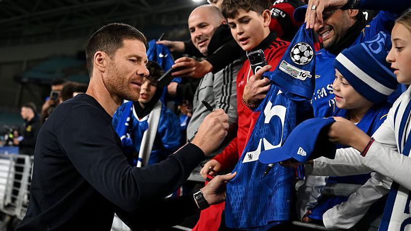 Xabi Alonso signs autographs for fans in Sydney