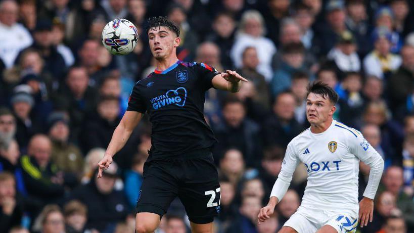 Kian Harratt playing for Huddersfield Town