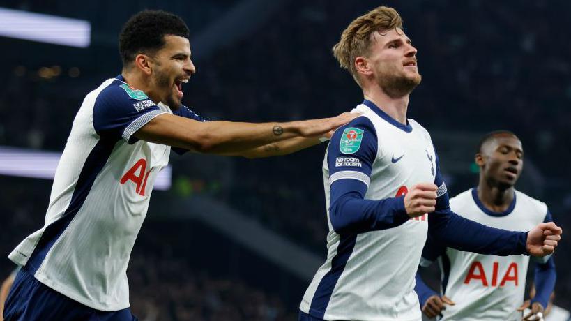 Dominic Solanke rushes to congratulate Timo Werner after he scores Tottenham's opener against Manchester City