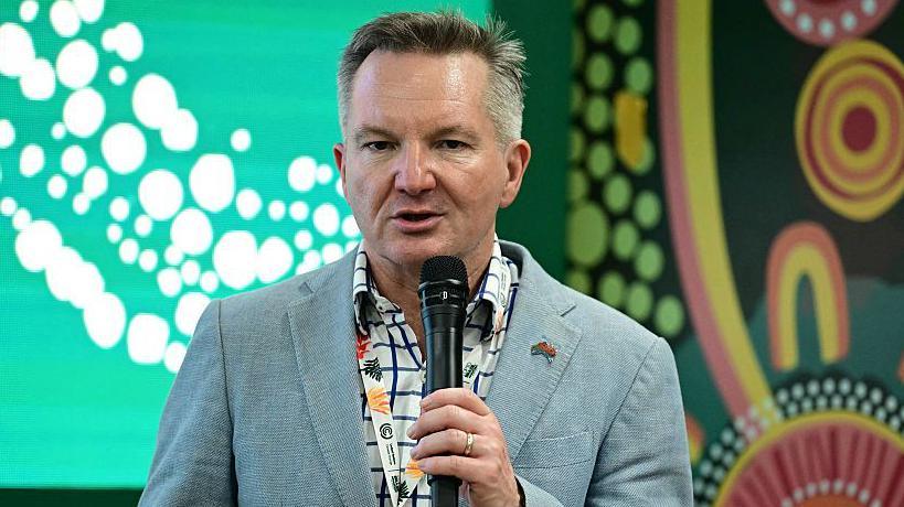 The Minister for Climate Change and Energy of Australia, Chris Bowen, speaks at Australia's pavilion during the COP30 UN Climate Change Conference in Belem, Para State, Brazil, on November 17, 2025.