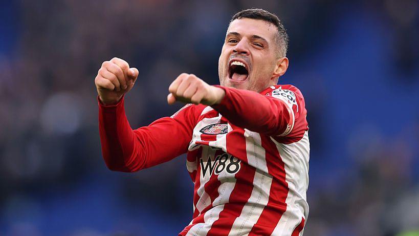 Granit Xhaka celebrates in a Sunderland shirt