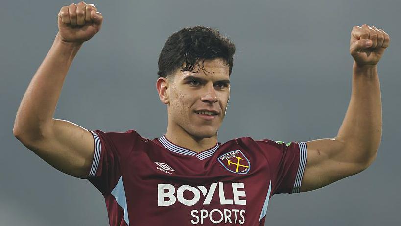 Mateus Fernandes with his arms aloft as he celebrates a West Ham win at Fulham in March 2026