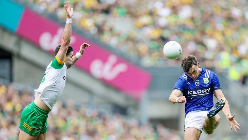 David Clifford kicks a two-point score at the end of the first half of the 2025 All-Ireland final.