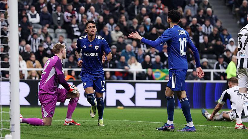 Camilo Duran of Qarabag FK celebrates scoring his team's first goal during the UEFA Champions League 2025/26 League Knockout Play-off Second Leg match between Newcastle United FC and Qarabag FK at St James' Park 