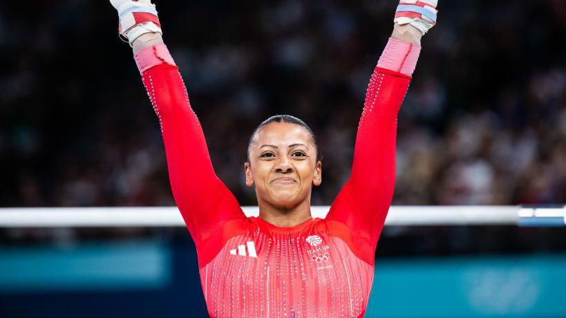 Rebecca Downie completing her uneven bars routine at the Paris 2024 Olympic Games