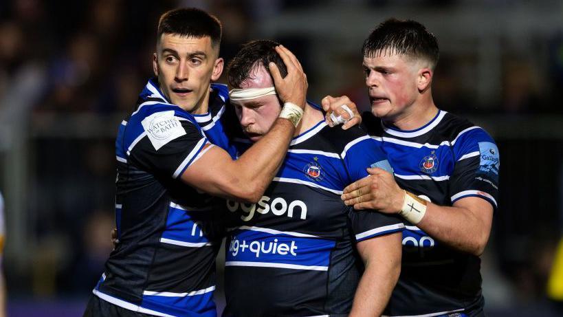 Arthur Green (right) celebrates a try with his team-mates in the Premiership Rugby Cup