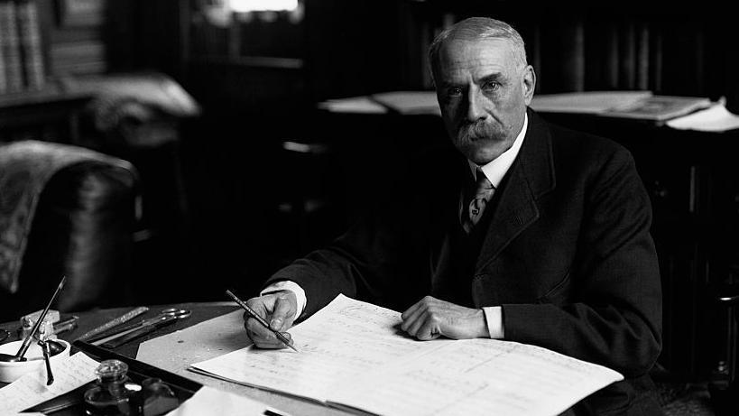 Sir Edward Elgar in his study