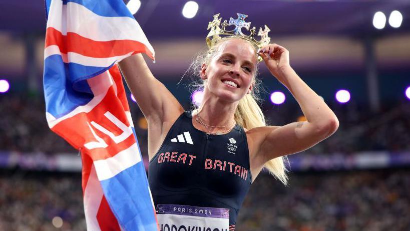 Keely Hodgkinson celebrates winning gold at the Paris Games