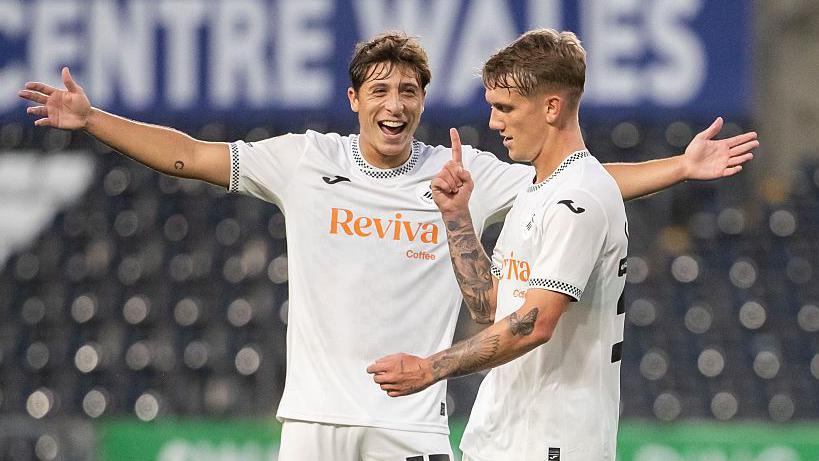 Ethan Galbraith celebrates his goal against Crawley with Goncalo Franco
