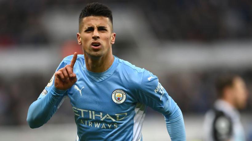 Joao Cancelo of Manchester City celebrates after scoring