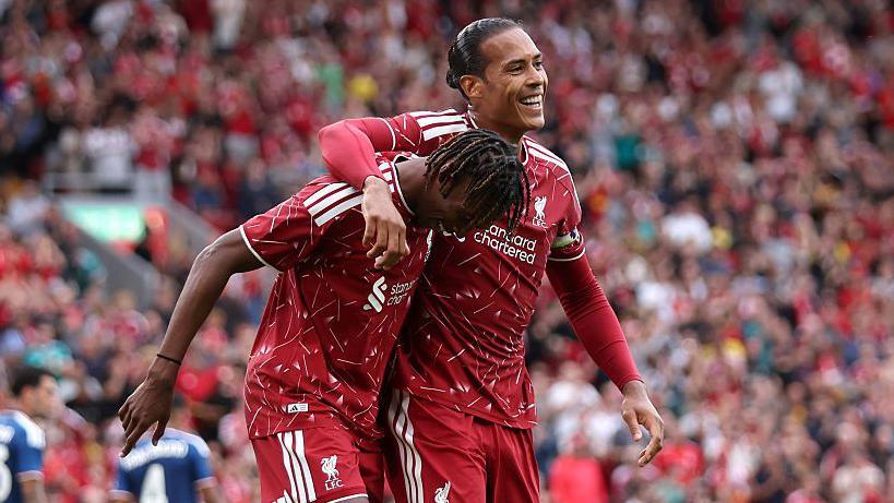 Jeremy Jacquet and Virgil van Dijk celebrating