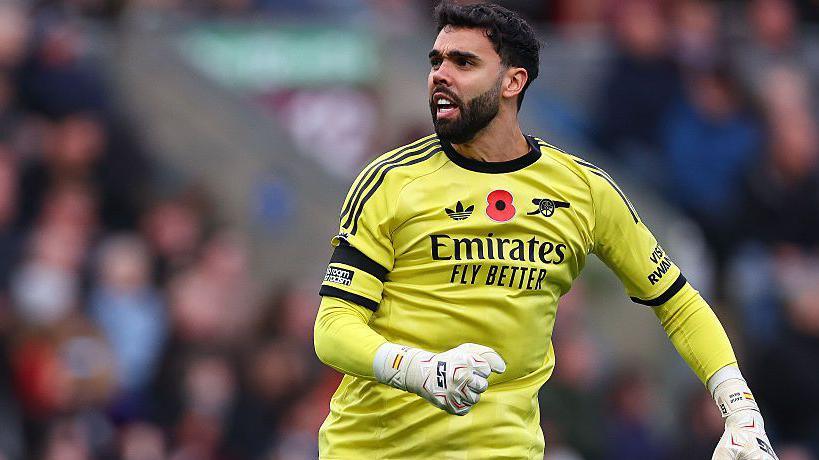 David Raya celebrates Arsenal's win against Burnley