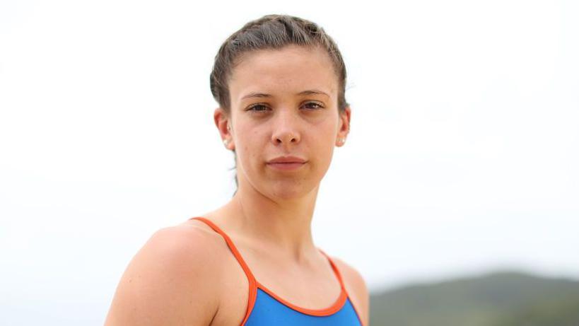 Sophie Coldwell poses during a Team England media opportunity ahead of the 2018 Gold Coast Commonwealth Games, at Noosa Beach on March 30, 2018 in Noosa, Australia.