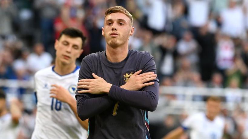 Cole Palmer celebrates after putting England ahead from the penalty spot